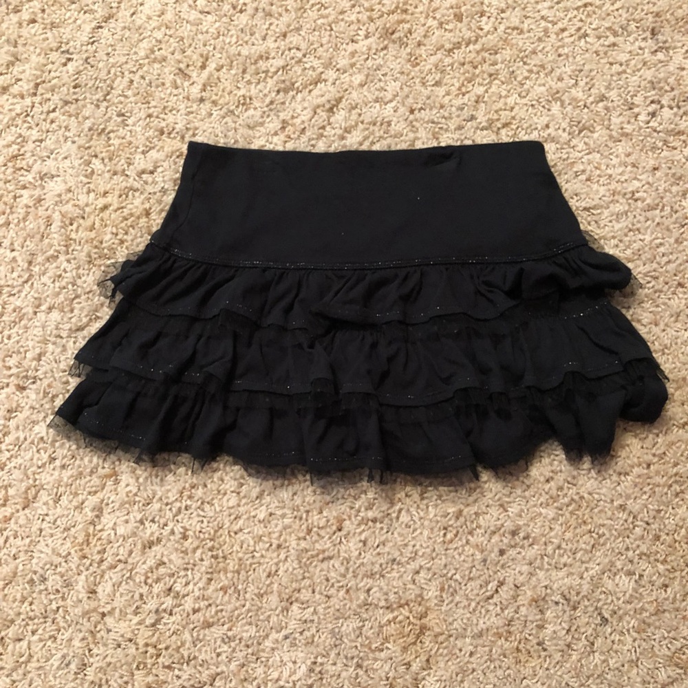 A black skirt with mesh lace like material